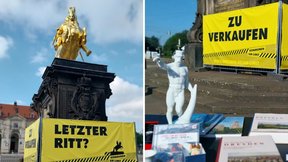 Das Bild zeigt den Goldenen Reiter mit den großen, gelben Plakaten "Zu verkaufen" und "Letzter Ritt?"